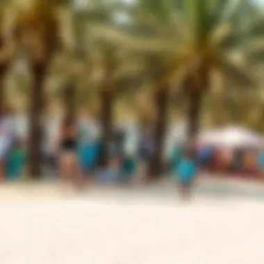Visitors enjoying recreational activities at Hudayriyat Beach